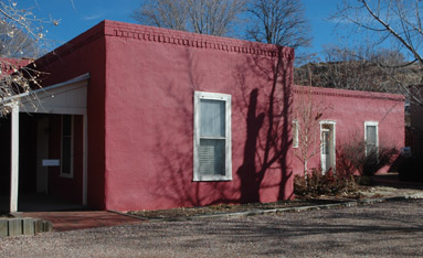 The little red house on Otero, between Marcy and Paseo, in Santa Fe.